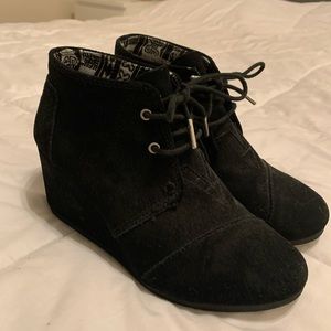 Black and wedge TOMS boots